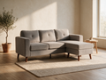Le Petit — canapé d'angle compact dans le salon PLOUMO